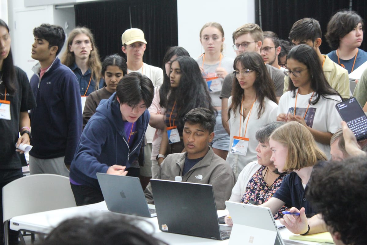 Teams working through a design problem